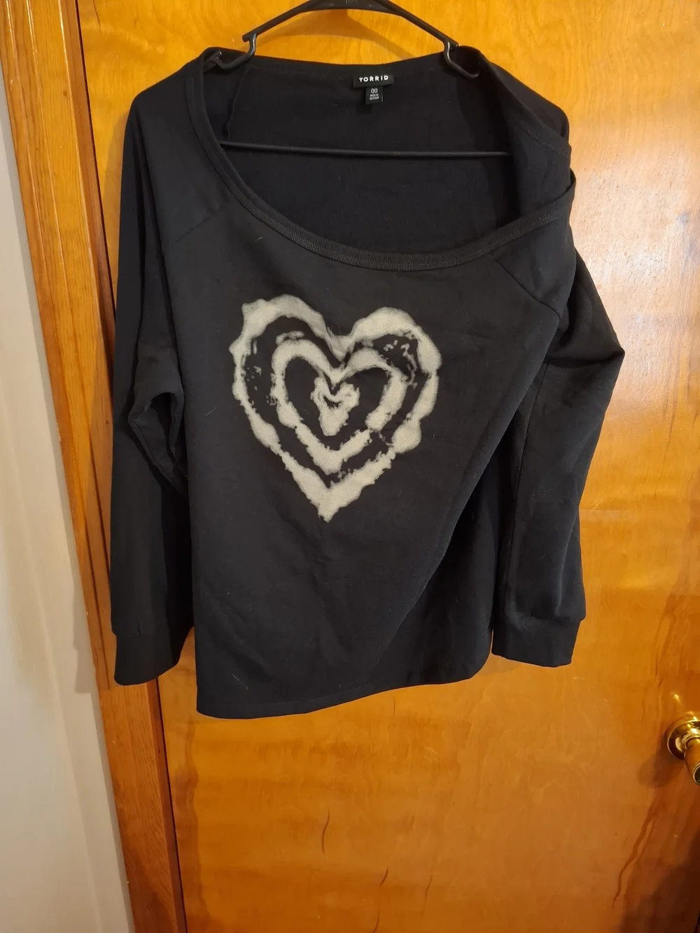 torrid Black Off-Shoulder Fleece Sweater with Cream Heart